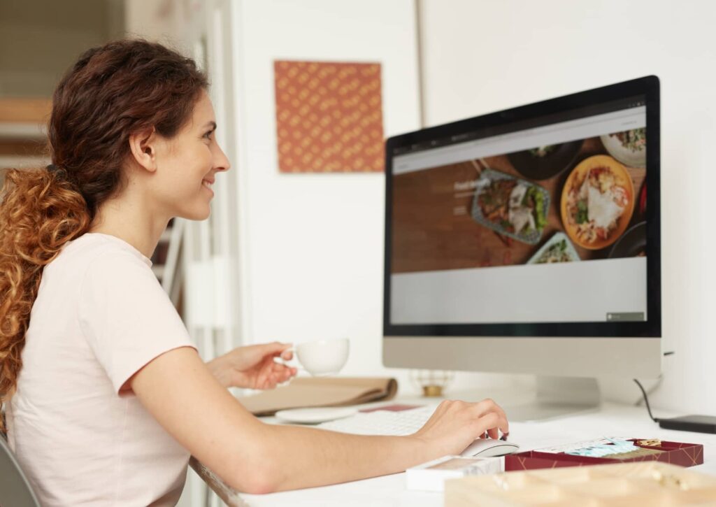 Lady working on SEO strategies at a computer in a Gold Coast office