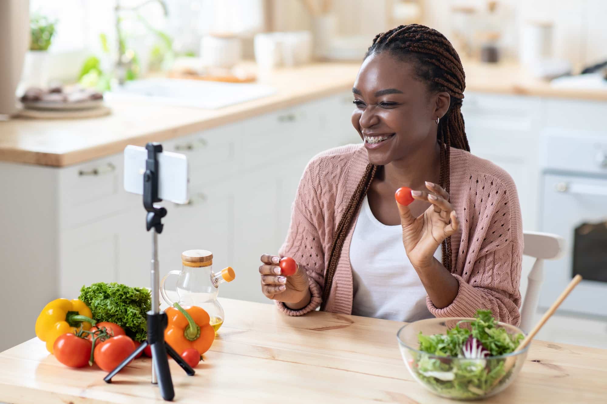 Online Nutritionist. Cheerful Young Black Female Recording Food Review In Kitchen